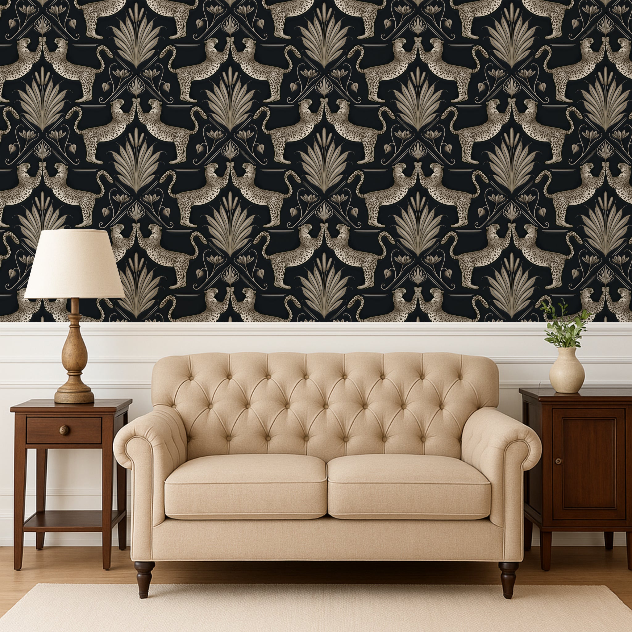 Beige tufted sofa in a room with decorative wallpaper and side tables.